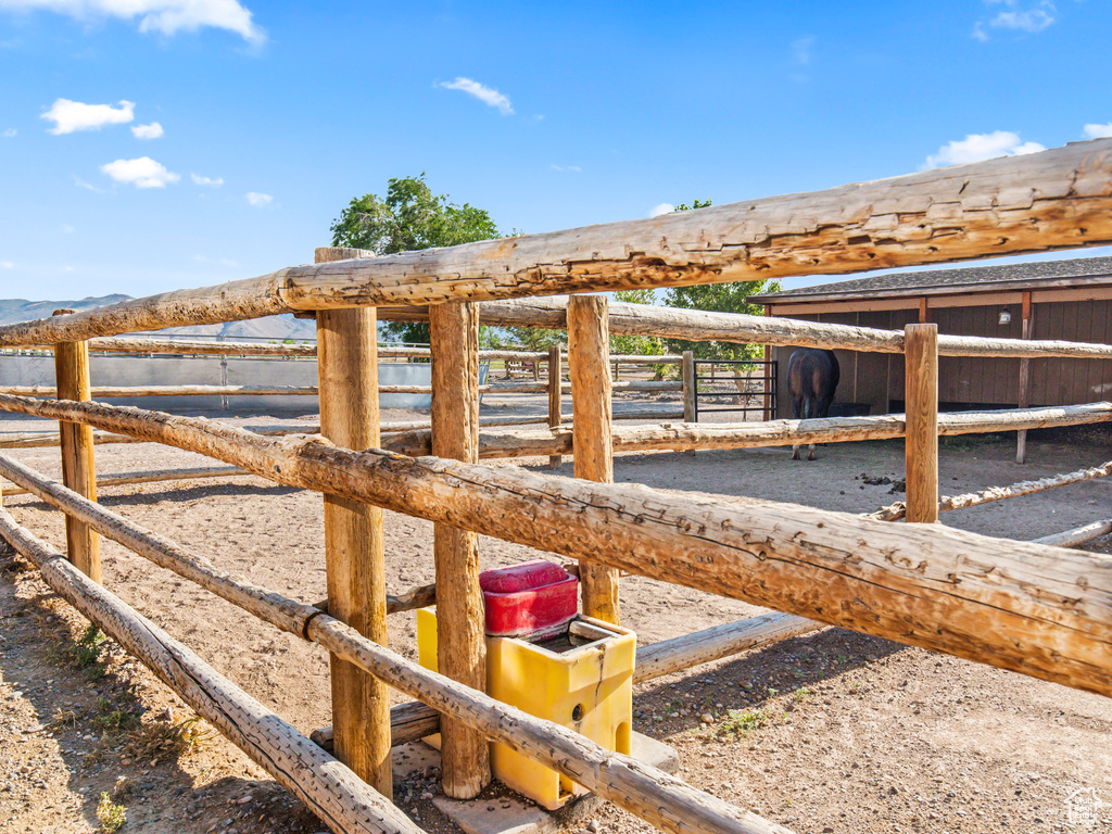 View of stable featuring an outdoor structure