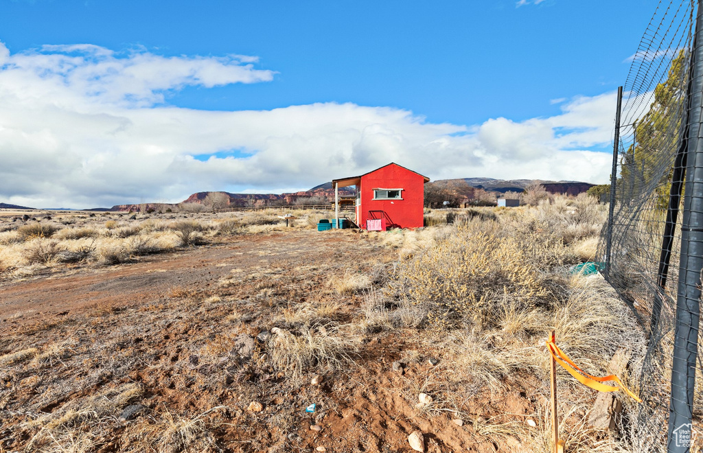 Exterior space with an outbuilding and a rural view