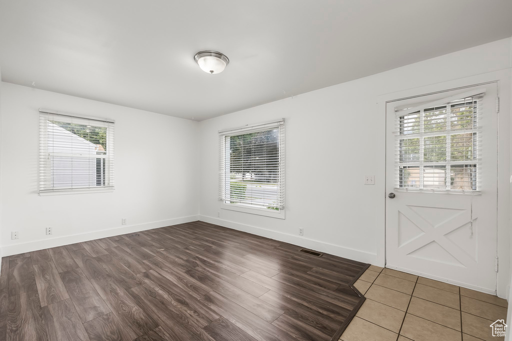 Unfurnished room with wood-type flooring