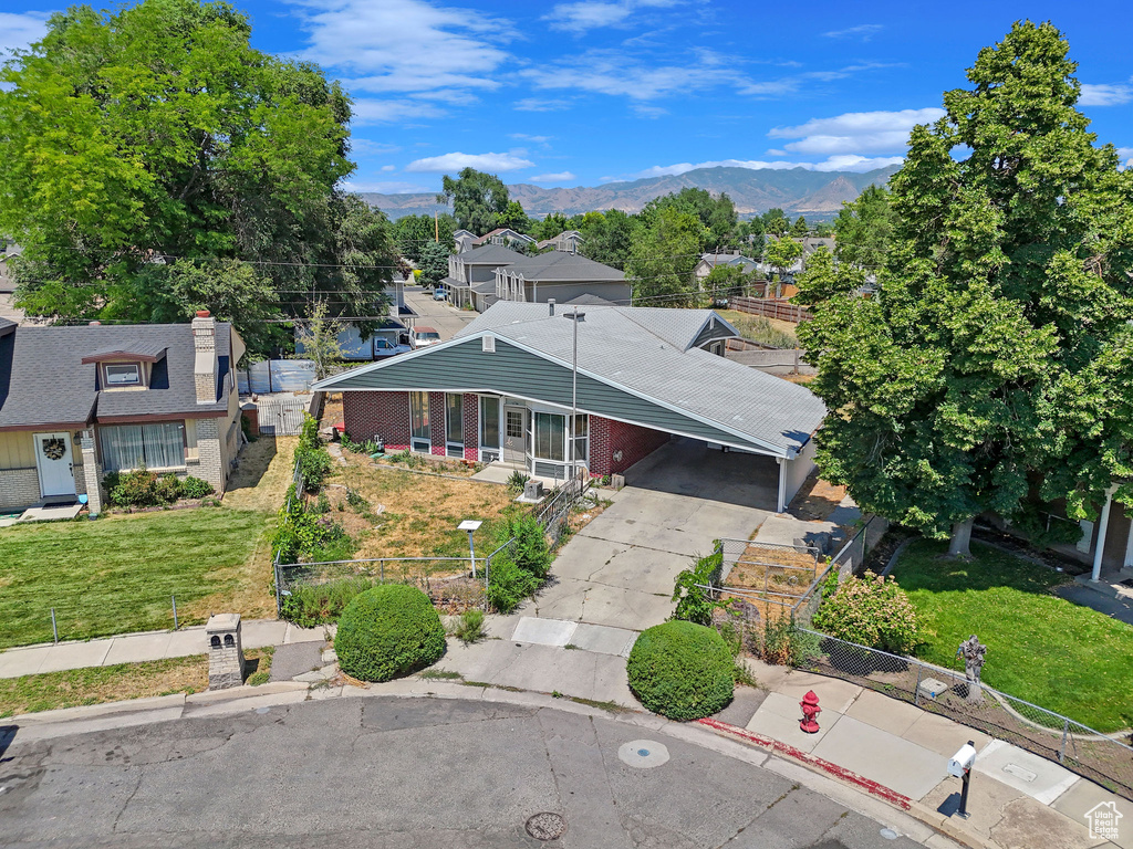 Birds eye view of property with a mountain view