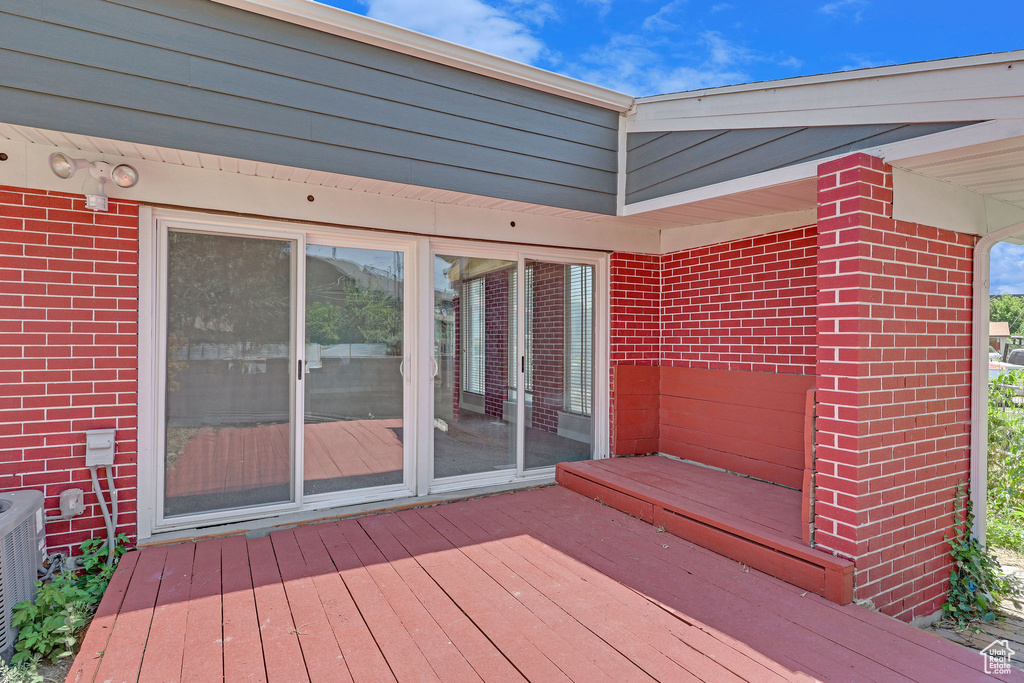 Wooden terrace with central AC unit