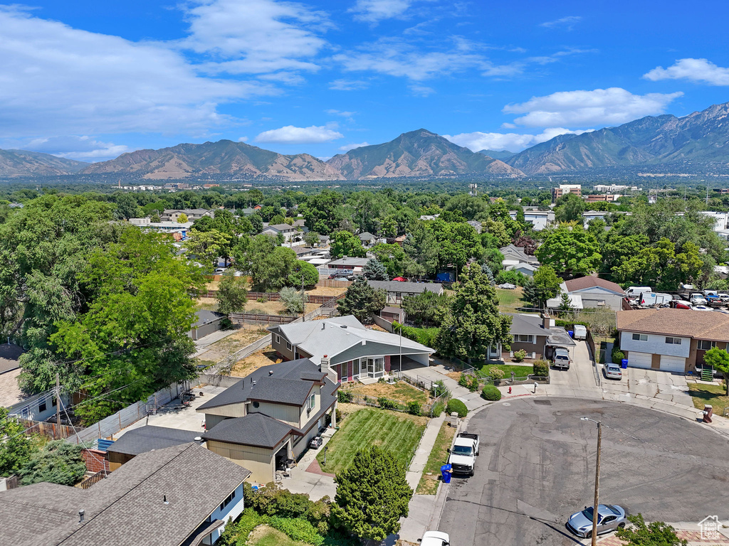 Birds eye view of property with a mountain view