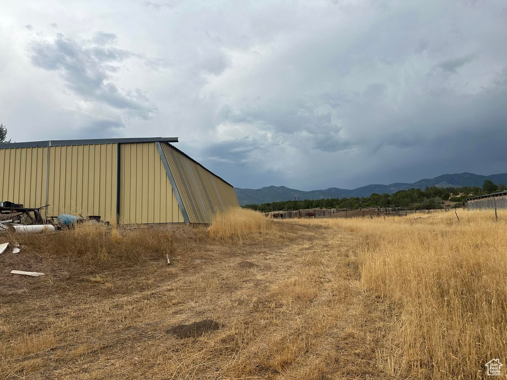 Exterior space featuring a mountain view