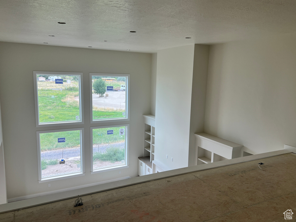 Interior space with a textured ceiling