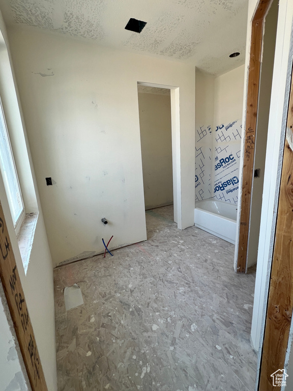 Bathroom with a textured ceiling