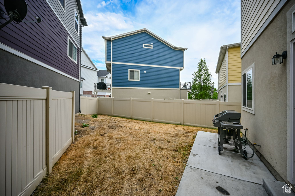 View of yard featuring a patio