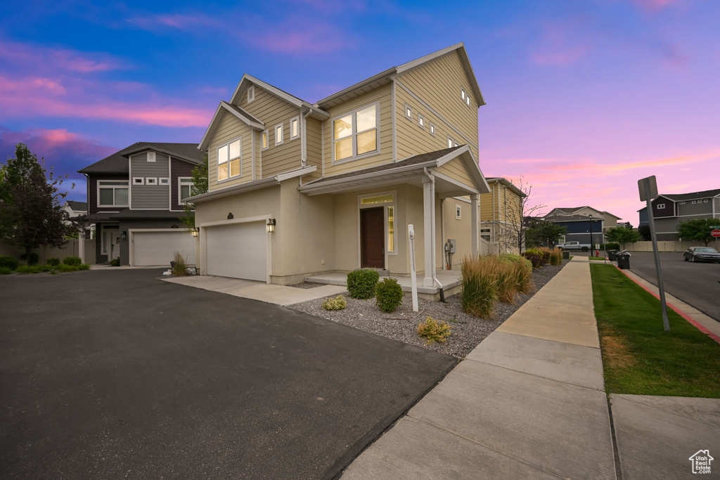 View of front of house with a garage