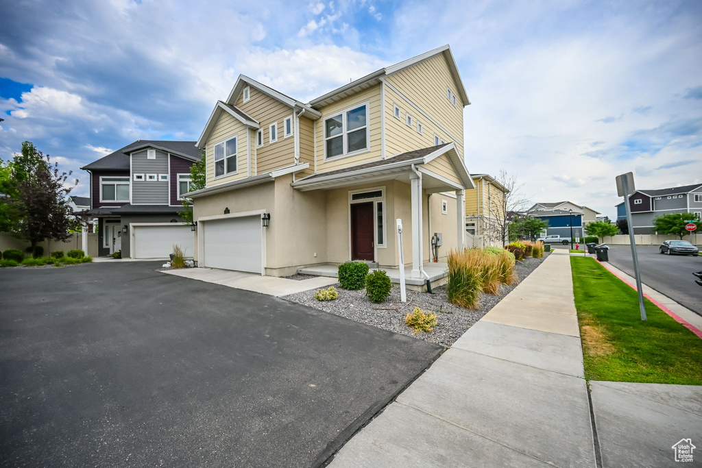 View of front of home with a garage