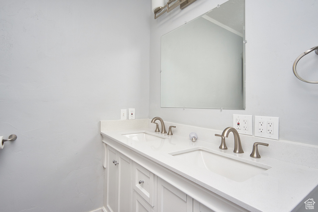 Bathroom featuring double sink vanity