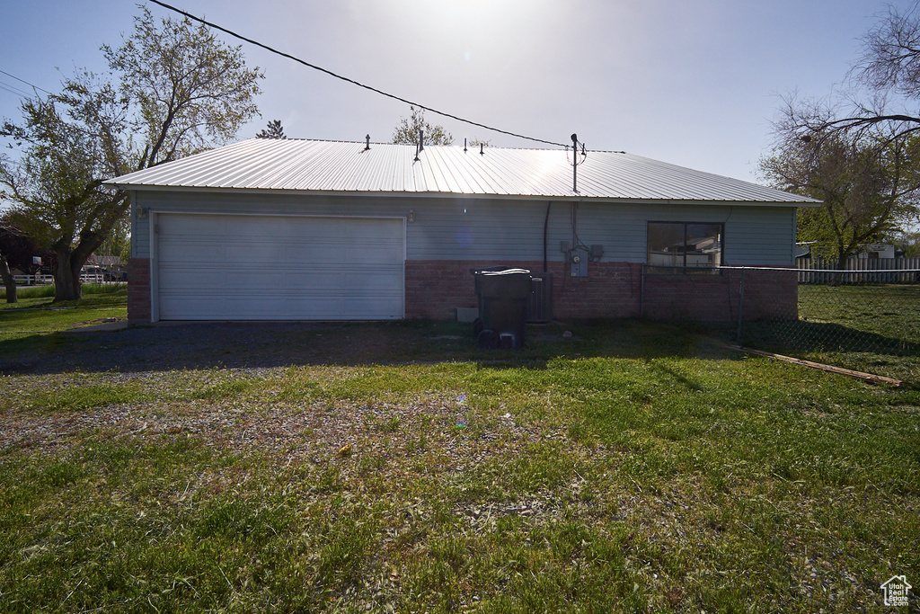 Exterior space with a yard