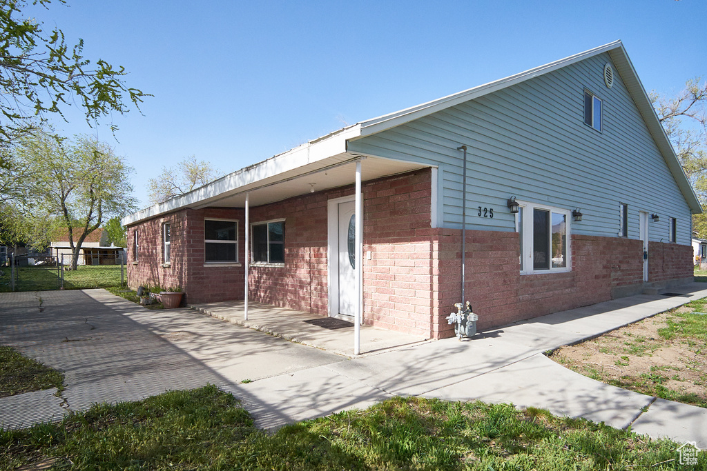 Back of property with a patio area