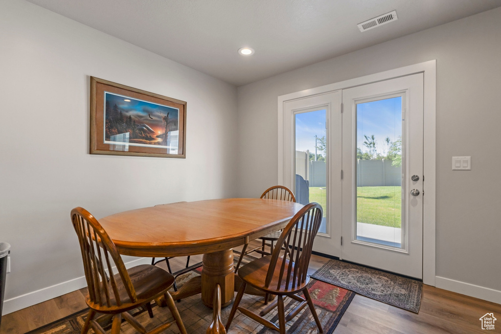 Dining space featuring hardwood / wood-style floors