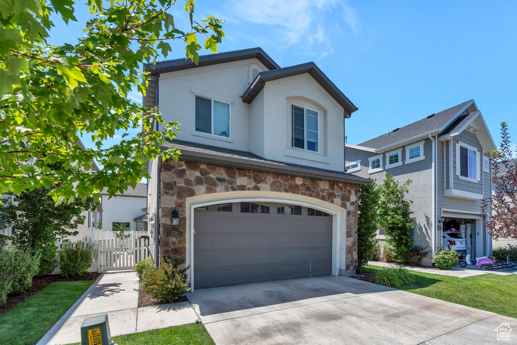 View of front of house featuring a garage