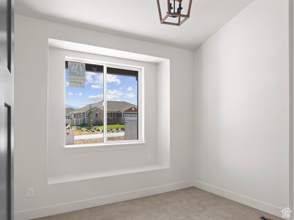 View of carpeted spare room