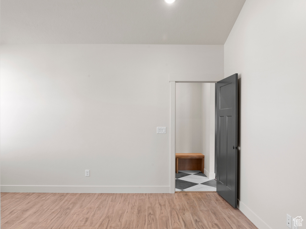 Empty room featuring light wood-type flooring