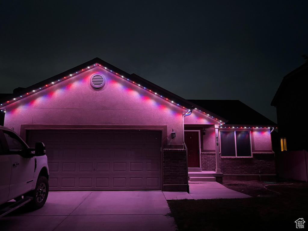 View of front of house with a garage