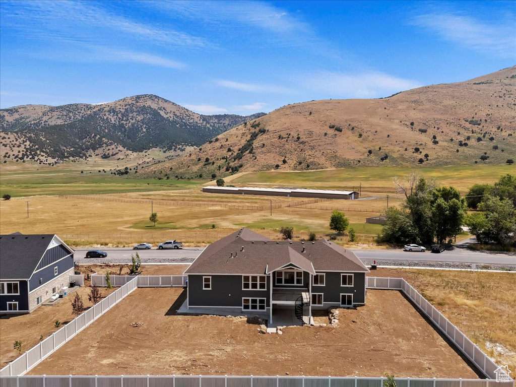 Exterior space with a mountain view and a rural view