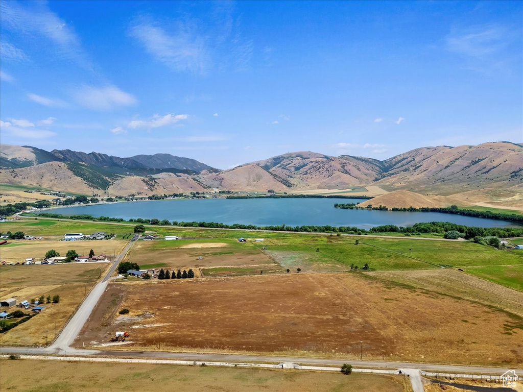 Exterior space with a rural view and a water view