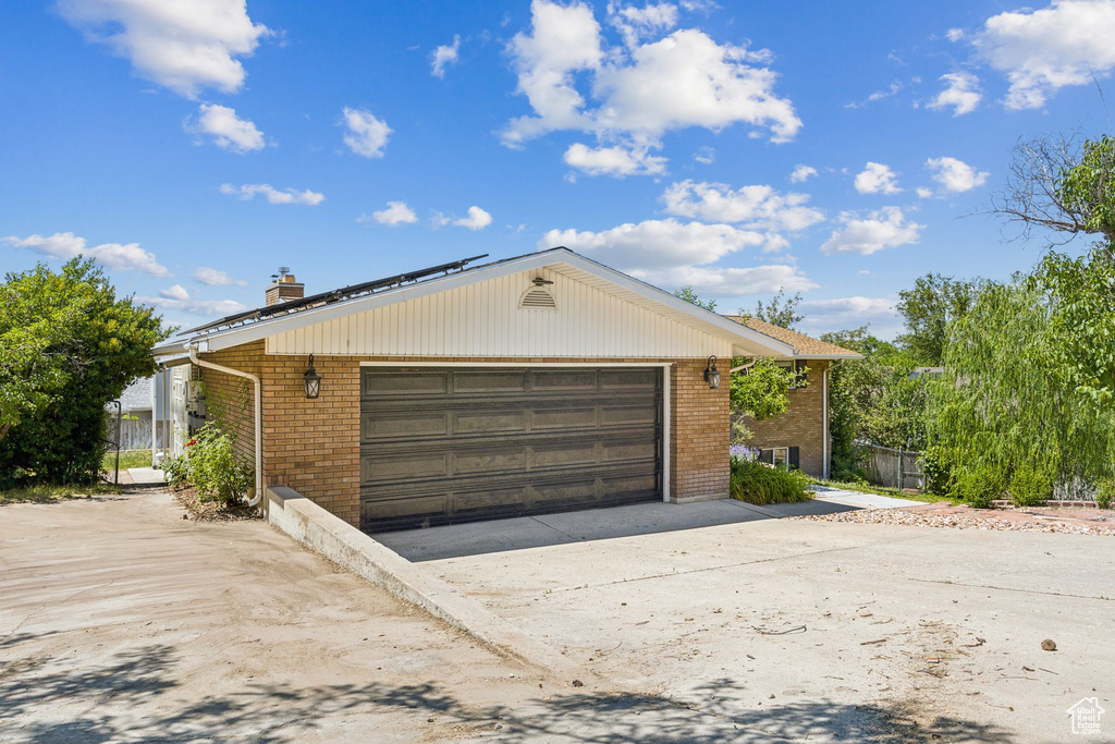 Single story home with a garage