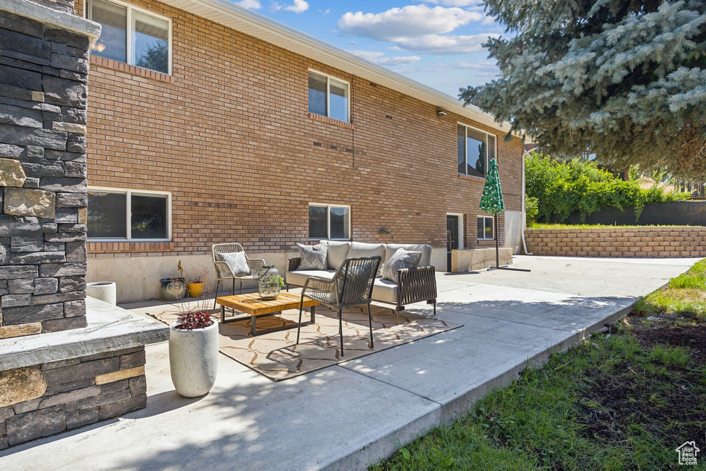 View of terrace with an outdoor living space