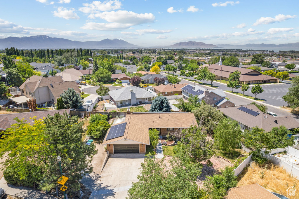 Birds eye view of property with a mountain view