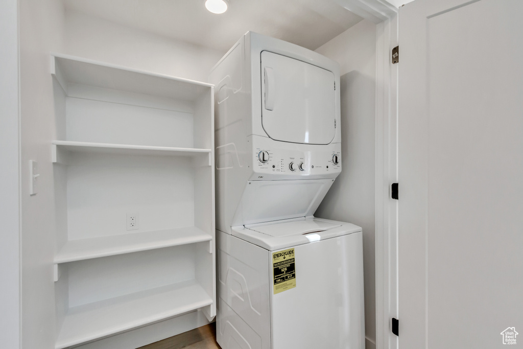 Clothes washing area with stacked washer and dryer