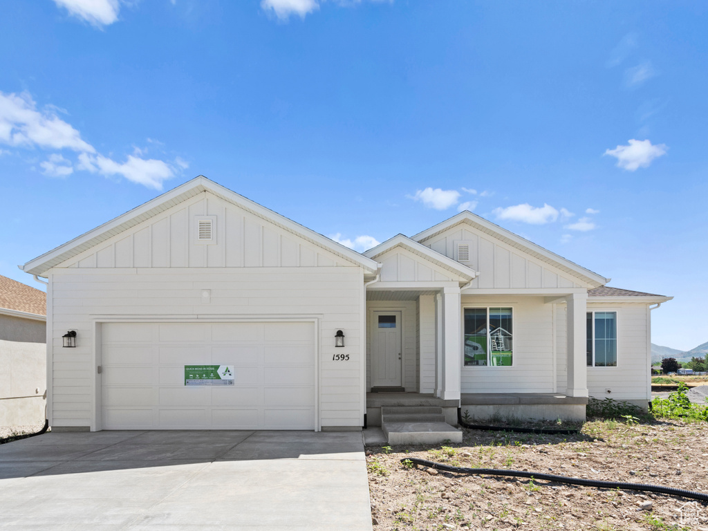 View of front of home with a garage