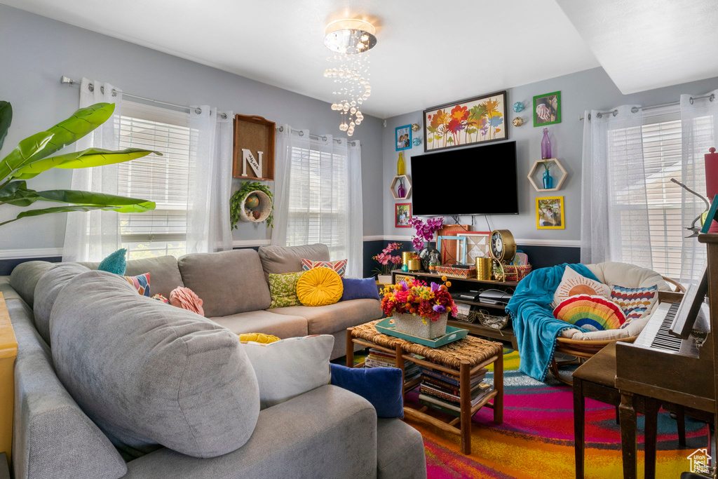 Living room featuring a chandelier