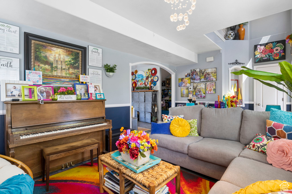 Living room featuring a chandelier