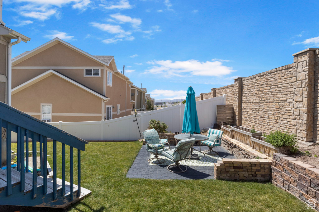 View of yard featuring a patio