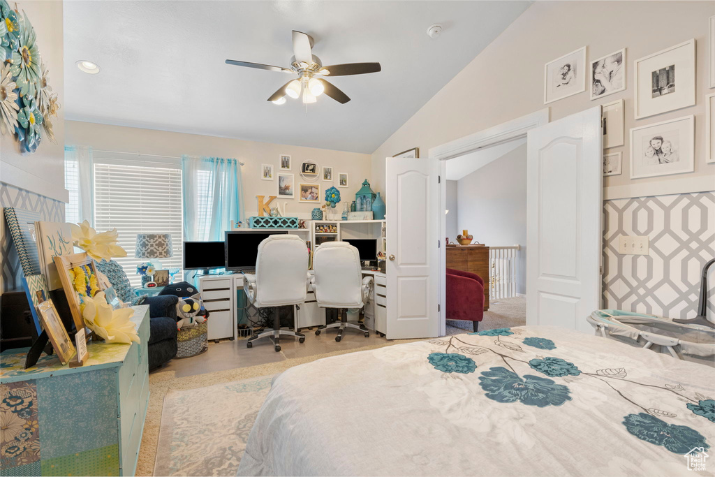 Bedroom featuring vaulted ceiling and ceiling fan