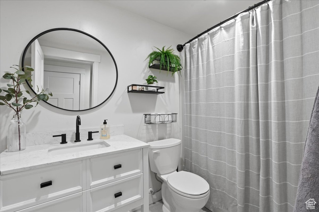 Bathroom with vanity and toilet