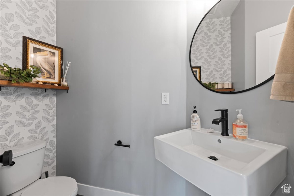 Bathroom featuring toilet and sink