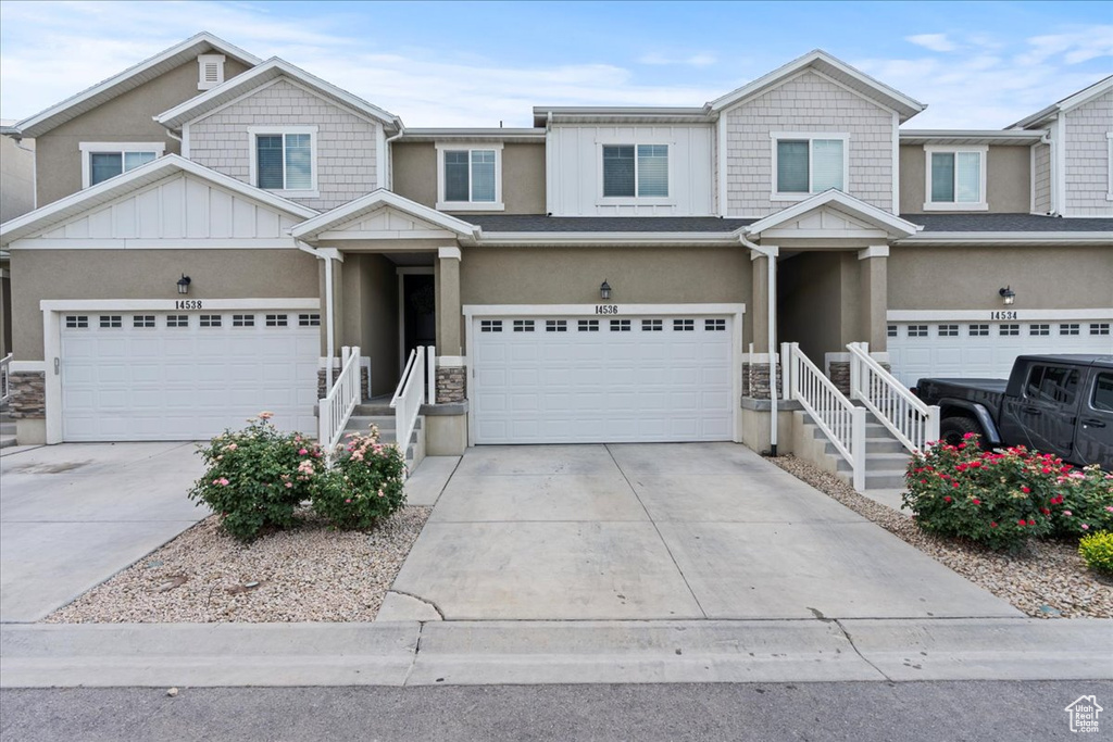 View of front of house with a garage