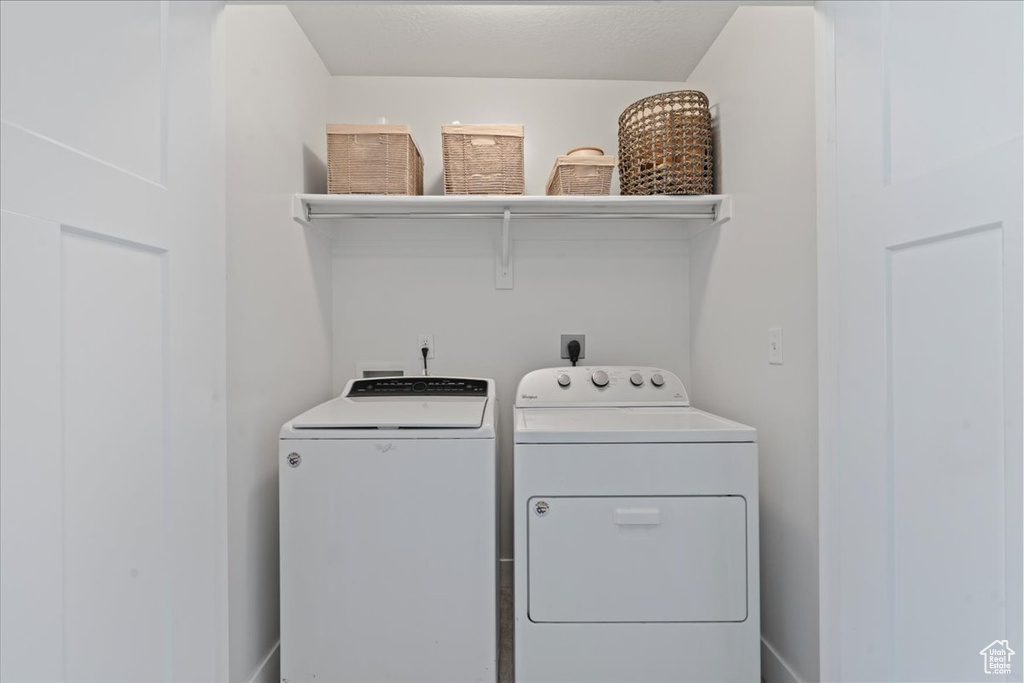 Laundry area featuring washing machine and dryer