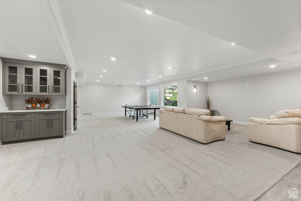 Living room with light colored carpet