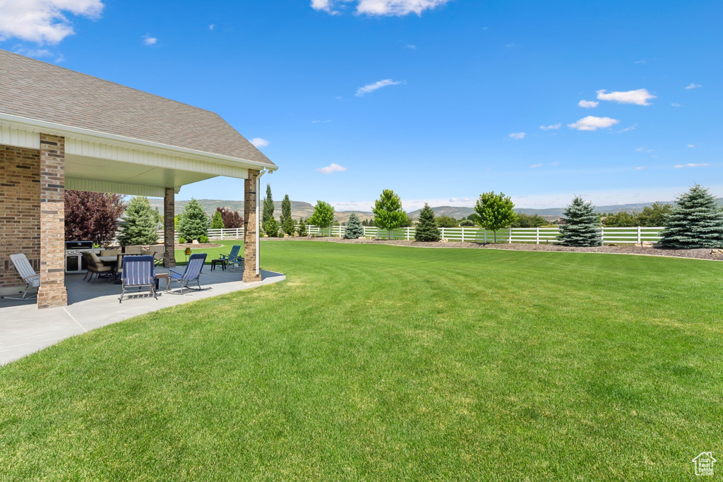 View of yard featuring a patio area