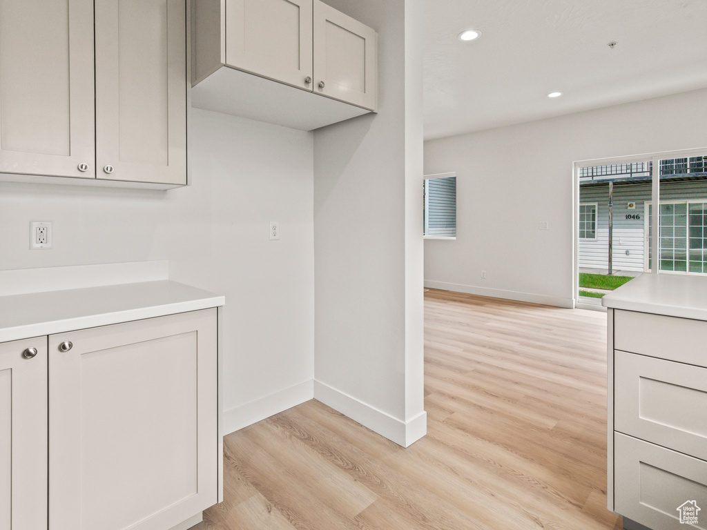 Kitchen with light wood-type flooring