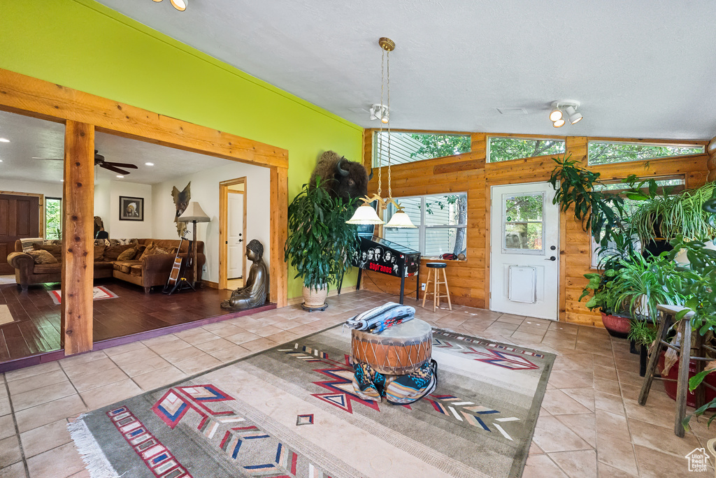 Interior space with vaulted ceiling and ceiling fan