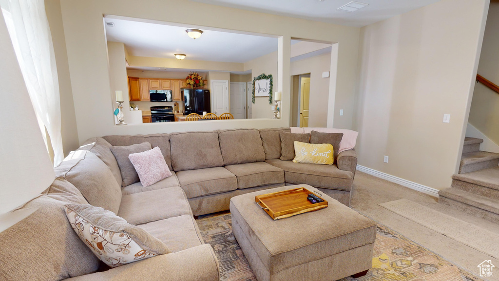 Living room with light colored carpet