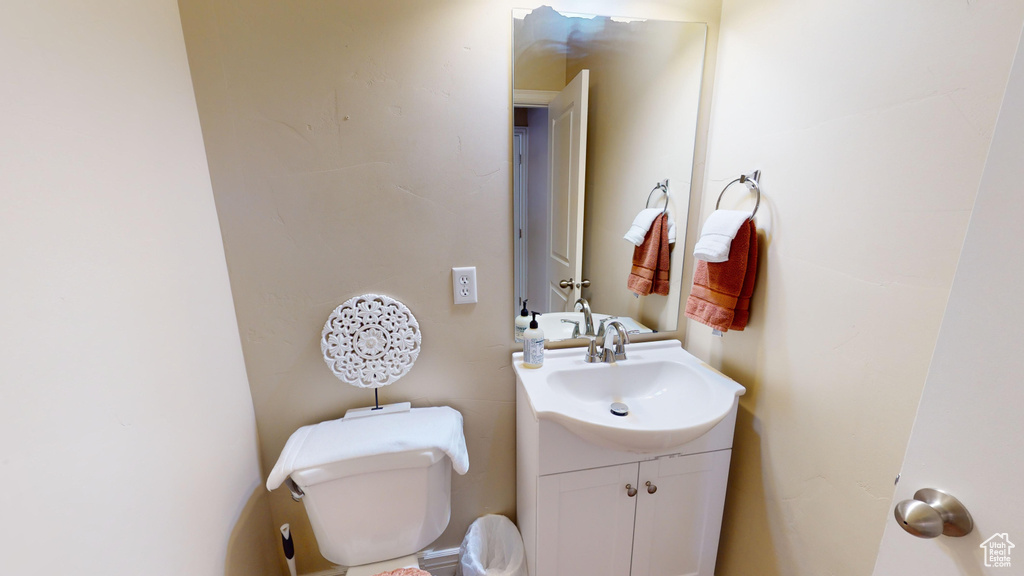 Bathroom with vanity and toilet