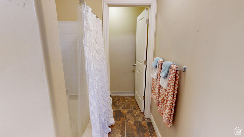 Bathroom with tile patterned floors