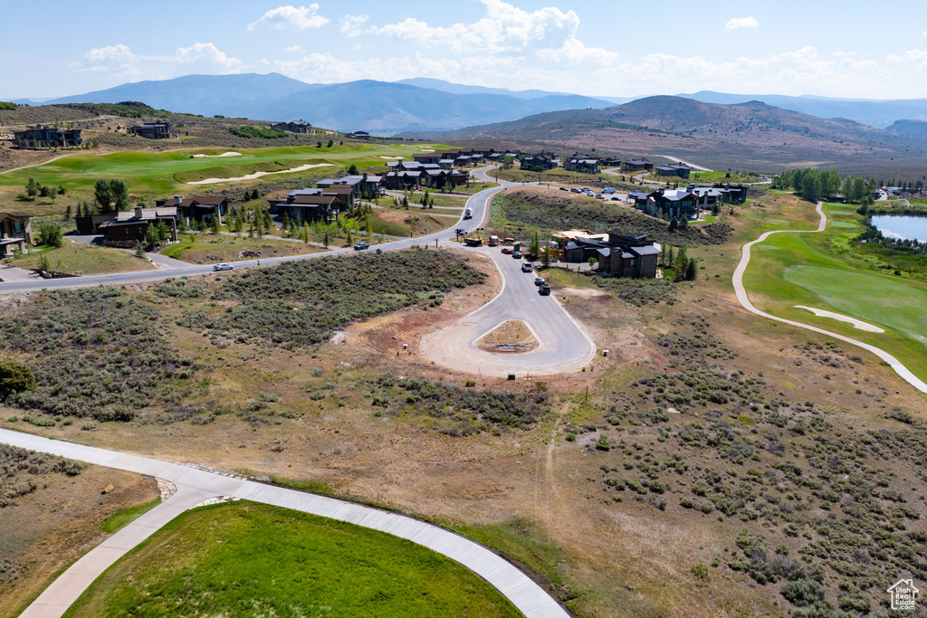 Birds eye view of property featuring a mountain view