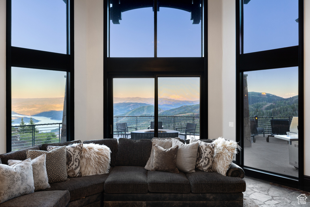 Living room with a mountain view and tile patterned floors