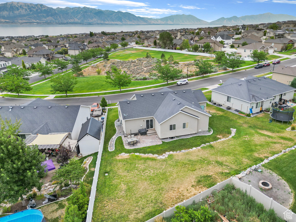 Birds eye view of property with a mountain view