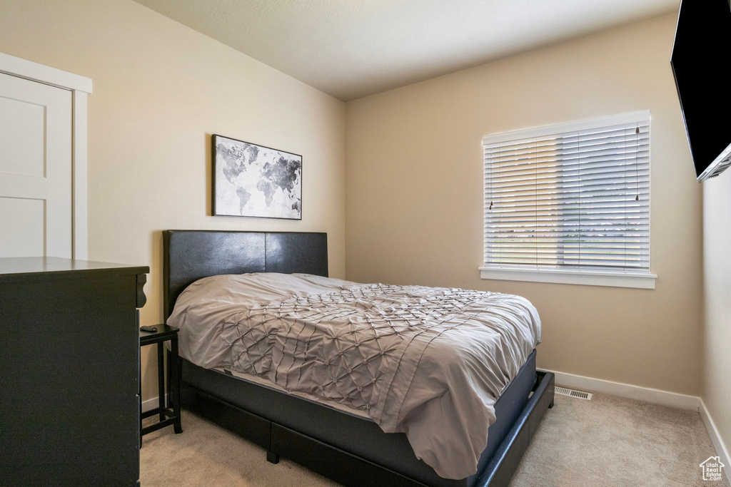 View of carpeted bedroom