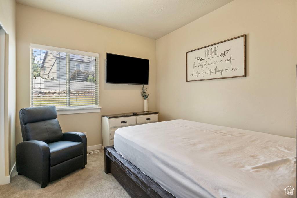 View of carpeted bedroom