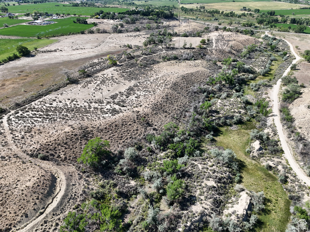 Birds eye view of property featuring a rural view