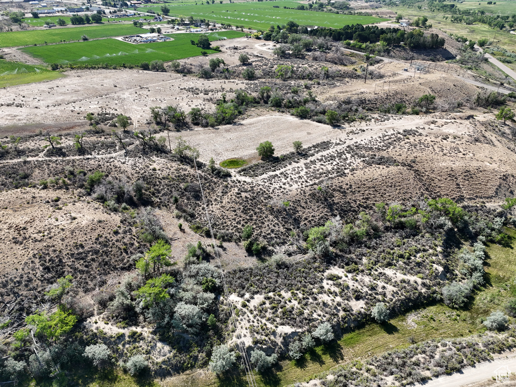 Birds eye view of property with a rural view