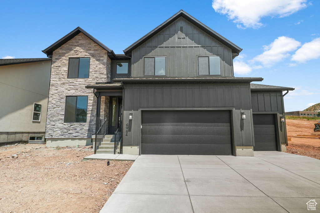 View of front of home with a garage